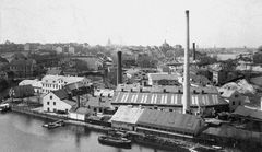 Lijleholmens stearinfabrik på 1890-talet med malmgården till vänster.