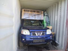 En container på drygt 7,2 ton med bil och blandat avfall på väg till Kamerun som stoppades 2022-04-21. Foto: Tullverket / Länsstyrelsen i Stockholm