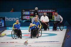 Landslaget i rullstolscurling under Paralympics 2018. Ronny Persson, Mats-Ola Engborg och Kristina Ulander