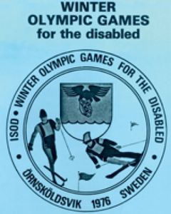 Alt-text: Logotyp för Winter Olympic Games for the Disabled 1976, med vintertema och skidåkare.