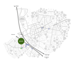 Karta över en stad med markerade områden och byggnader.