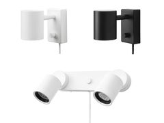 Vägglampor i svart och vit färg, med moderna, cylinderformade design.