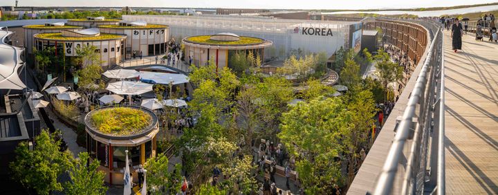 View of the German Pavilion at Expo Osaka, with the iconic ring structure in the background. Photo credit: Jakob Studnar/Koelnmesse