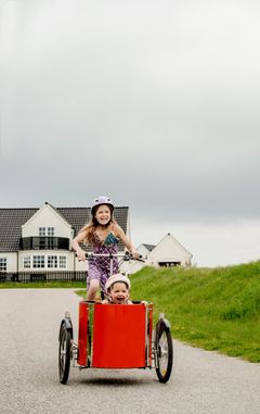 Barn i en cargo-bike © Mette Johnsen