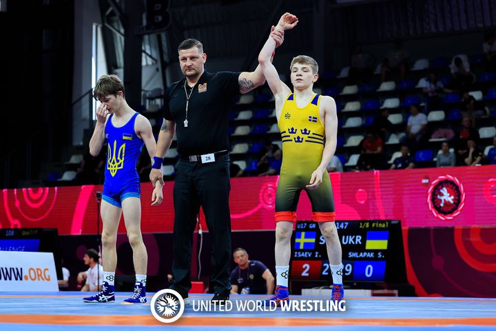 Islam vinner åttondelsfinalen (Foto: UWW)