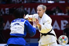 Ida Eriksson (i vitt) mot japanskan Rinako Saijo i match om bronset.