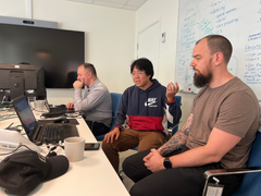 Jonas Seider, Australian Federal Police (right) with project team members Rob Wang and Mikel Mazlaghani.