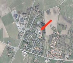 Kartbild med markering av gamla skolan i Ölmstad.