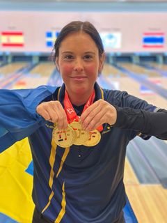 Lisa Nordström Green med sina tre guldmedaljer i para-VM.