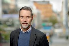 Bild på en man i kostym
