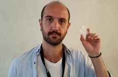 A microchip that could help reduce the process time for blood analysis is displayed by Selim Tanriverdi, a PhD student at KTH.