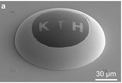 SEM image of a 3D surface with the patterned letters ‘KTH’, each letter patterned in a different thin-film material.