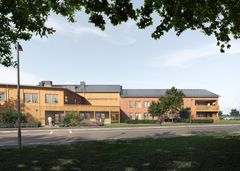 En stor byggnad med grått tak
