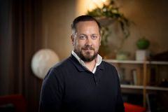 Porträtt på man i kontorsmiljö