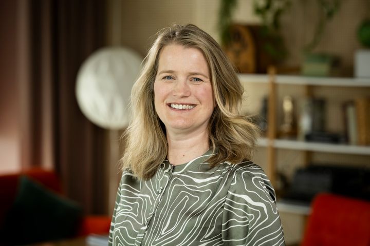 Porträttfoto leende kvinna