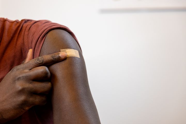 Bild på en vaccinerad person.