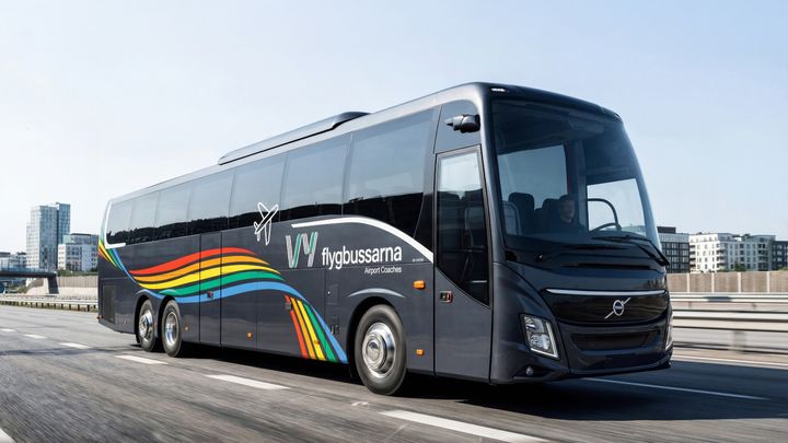 Buss från Vy flygbussarna i rörelse med ny grafisk design som har färgglada linjer och logotyp.