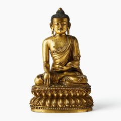 An Important Chinese Gilt-Bronze Figure of Shakyamuni Buddha.
