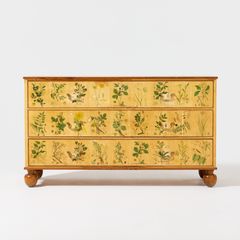 JOSEF FRANK. “Flora,” dresser, Firma Svenskt Tenn, model no. 1050, mahogany, upholstered with botanical prints from Nordens flora by Carl Lindman.