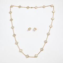 VAN CLEEF & ARPELS. Necklace and a pair of earrings, “Vintage Alhambra”, 18K gold and mother-of-pearl, Paris.
