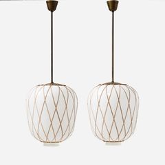 HARALD NOTINI. Ceiling lights, a pair, Arvid Böhlmarks Lampfabrik, 1940s, model 11555, brass, shades in white cased glass with woven rattan.