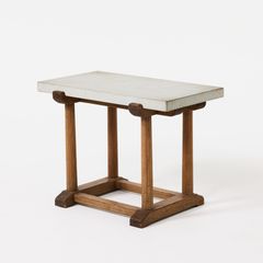 AXEL EINAR HJORTH. “Sandhamn”, table, Nordiska Kompaniet, 1932, acid-stained pine, top in Gotland sandstone.