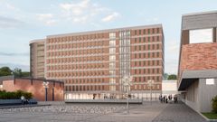 Bild av Gymnasietorget med ett stort parkeringshus i bakgrunden som ska ha plats för 300 bilar.