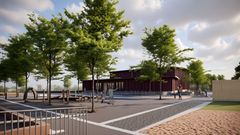 Ny idrottshall med moderna lekredskap och gröna träd i närmiljön.