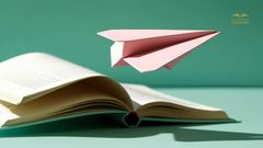 Öppen bok med ett pappersflygplan