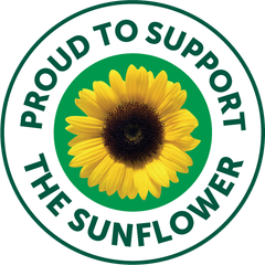 Badge med en solros och texten "Proud to support the sunflower".